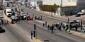 La SEGOB en comunicación familia de jóvenes desaparecidas; continúa el bloqueo en la carretera a Atlixco