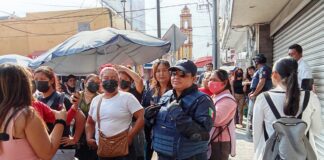 Enfrentamiento entre ambulantes y policías de Izucar